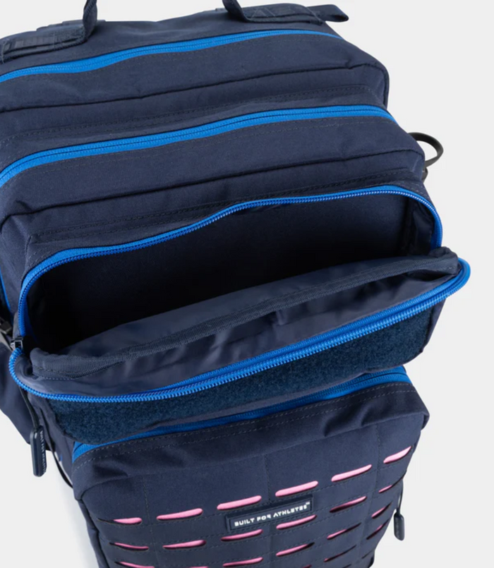 Side and top view of the navy backpack showcasing blue zippers and a Built for Athletes patch