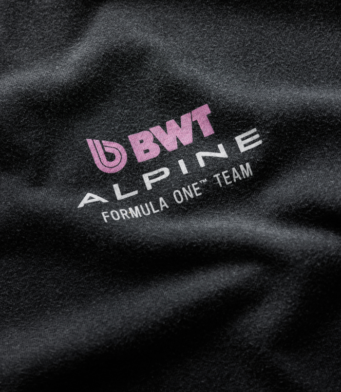Back close up of the Washed T-shirt showing a pink circular graphic with a woman's face and Racing Team Miami text