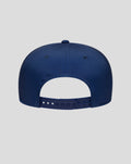 Back view of a blue New Era Alpine Silverstone 9Seventy Stretch Snap Cap with an adjustable snapback.