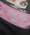 Close up of the pink helmet print on the back of the Washed Black Duke and Dexter T shirt