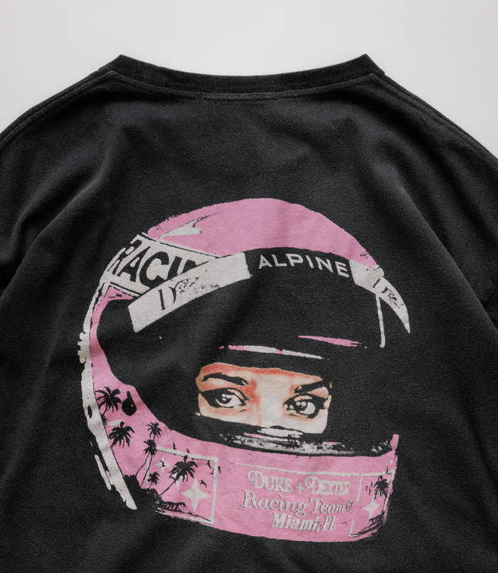 Back view of a black Washed T-shirt with a large pink graphic and Duke+Dexter Alpine branding
