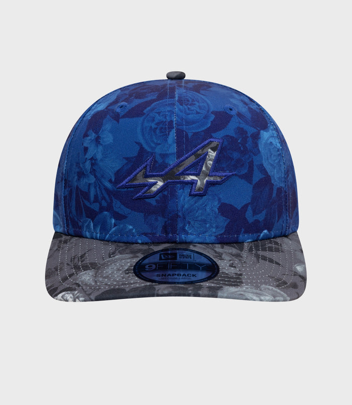 Blue floral 9Fifty cap with gray camo visor curved brim and sticker on the brim