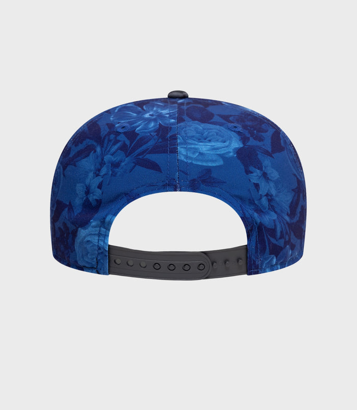 Back view of navy floral 9Fifty cap showing top button and light interior lining