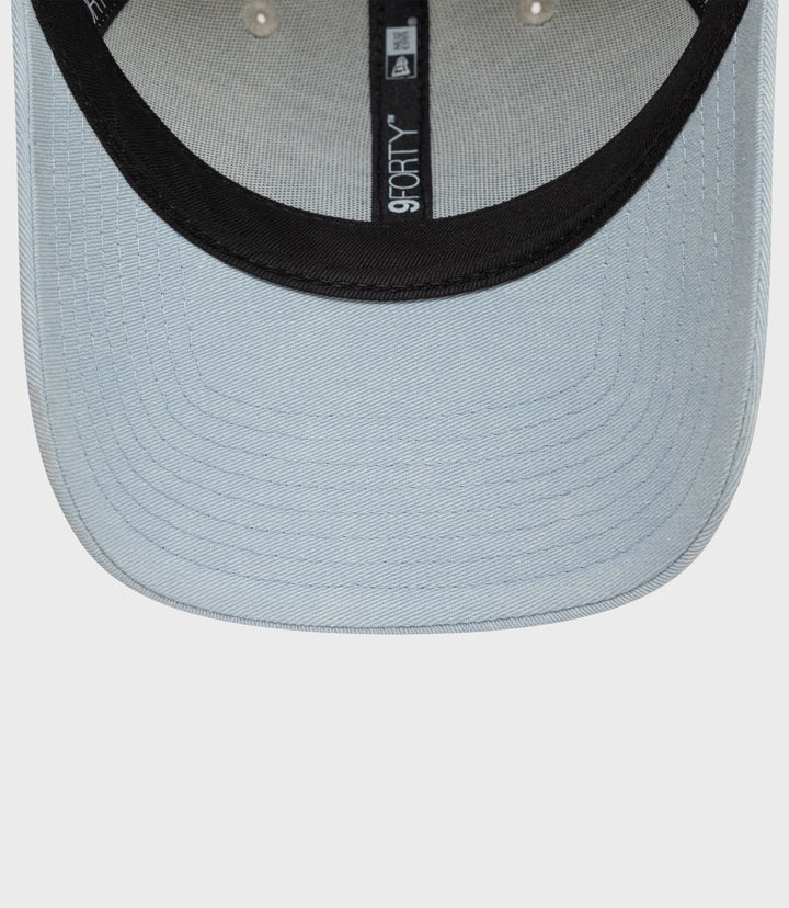Blue denim Alpine Acid Wash 9Forty cap back view with adjustable strap and metal buckle