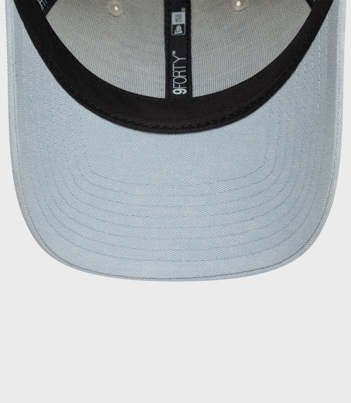 Blue denim Alpine Acid Wash 9Forty cap back view with adjustable strap and metal buckle