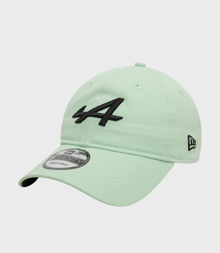 Mint green New Era Alpine 9Twenty cap close up with black embroidery on the front panel and a prominent top button