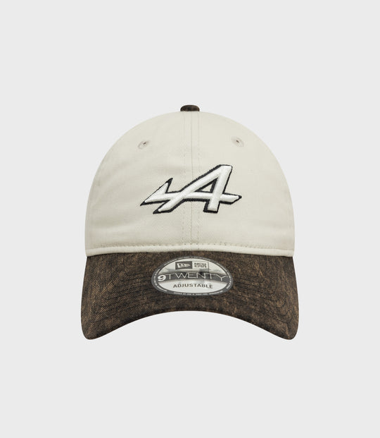 Front close up of white Alpine Acid Wash 9Twenty cap with embroidered crown detail and brown top button