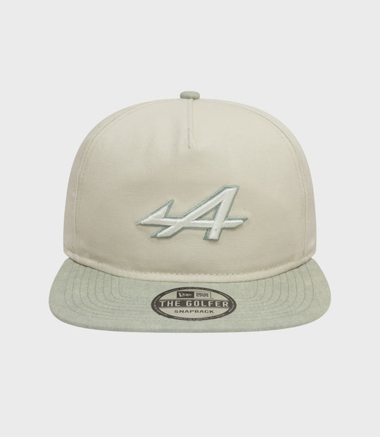 Front view of white Alpine Acid Wash Golfer Cap with mint brim and top button and pale blue embroidery on the front panel