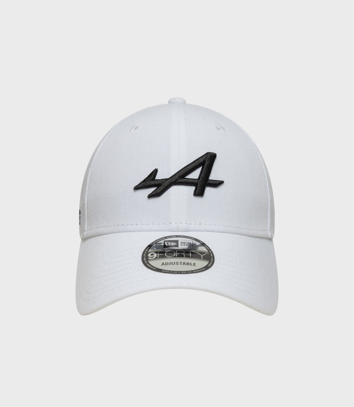 White New Era Alpine Estretch 9Forty cap with bold black embroidered logo on the front panel.