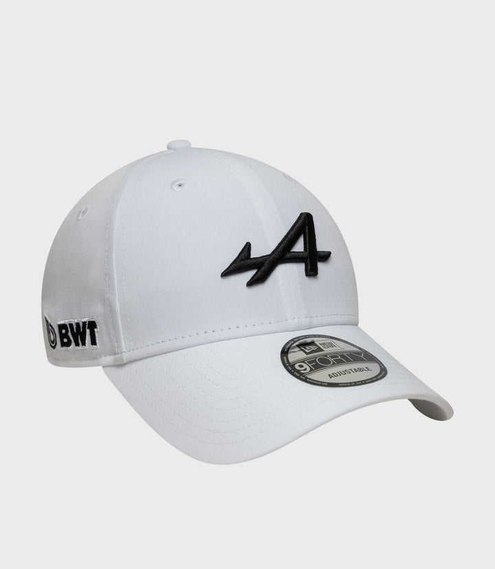 White 9Forty cap with black embroidered front logo and New Era sticker on the brim.