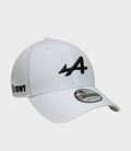 White 9Forty cap with black embroidered front logo and New Era sticker on the brim.
