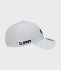 White cap shown from side with black embroidered logo, BWT label on the side, and brim sticker visible.
