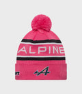 New Era Alpine Jack Doohan pink cuff knit hat with fluffy pom and striped band