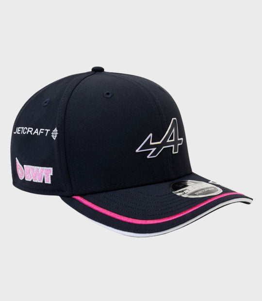 Front view of navy 9Seventy cap showing the front panel logo and curved visor