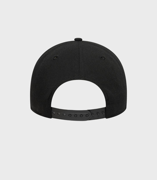 Rear view of the black New Era cap showing the adjustable snapback strap