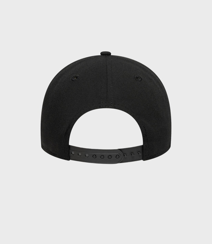 Rear view of the black New Era cap showing the adjustable snapback strap