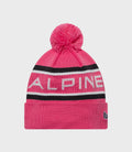 Bright pink Alpine knit hat with bold ALPINE text on the cuff and knit pom on top