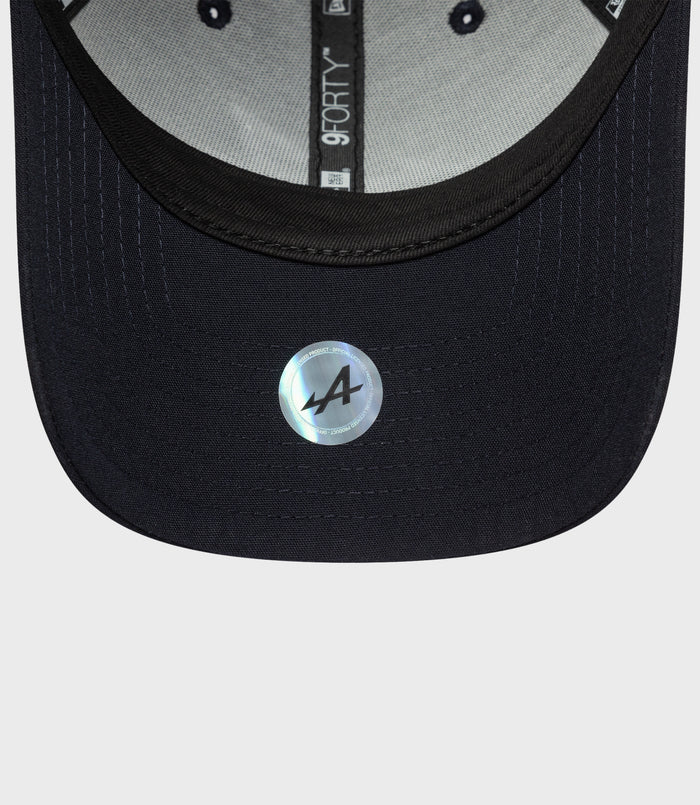 Inside view of navy Alpine Repreve 9Forty cap showing light gray undervisor and 9Forty label along the crown