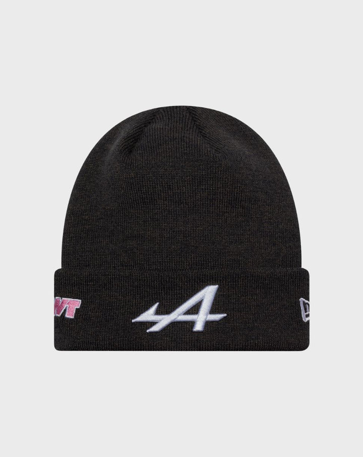 Navy cuffed knit beanie with folded brim and white embroidered logo on the front