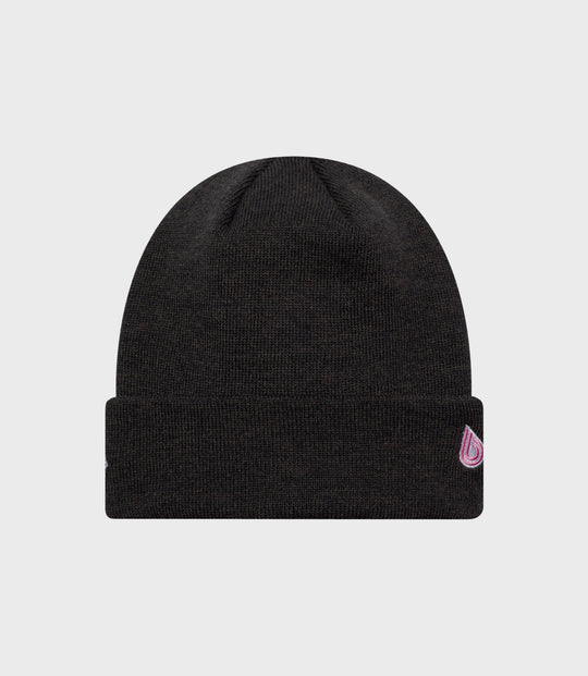 New Era Alpine Polyana navy cuff knit hat with ribbed crown and pink logo patch