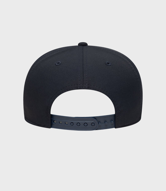 Navy Alpine 9Seventy cap viewed from front with curved brim