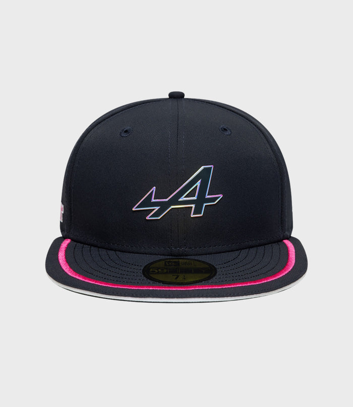 Front view of navy Alpine New Era 59Fifty cap with a multicolor front logo and pink piping along the brim