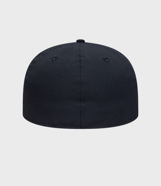 Front view of navy Alpine 59FIFTY cap with stitched crown and small top button.