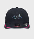 Close-up of navy Alpine 9Seventy Junior cap with iridescent logo on the front crown