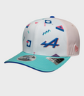 White 9Seventy Stretch Snap cap with a blue top button and pastel geometric graphics on the crown