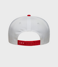 Rear view of white New Era Alpine Japan 9Seventy stretch cap showing a red crown button