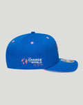 Side view of blue cap featuring Change The World sip by sip graphic on the left panel