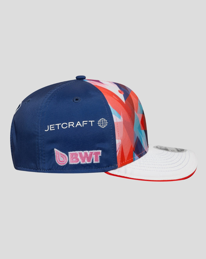 Rear view of the cap with navy back panel and Jetcraft and BWT logos, plus the vibrant geometric crown extending to a white brim.