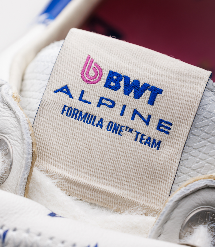 Beige fabric tag showing BWT Alpine logo and Alpine branding