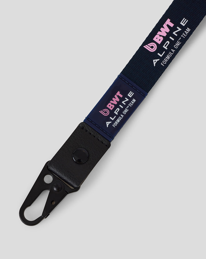 Close up of navy BWT Alpine Formula One Team lanyard showing branding and the metal clip