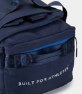 Close up of navy duffel showing blue zipper trim and Built For Athletes branding