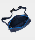 Top view of navy Built for Athletes crossbody bag with blue strap and buckle
