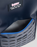 Close-up of TYRO 20L front panel showing BWT Alpine logo and blue zipper.