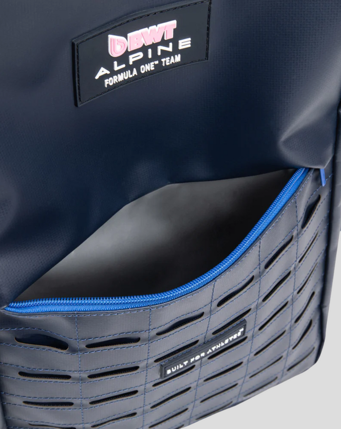 Close-up of TYRO 20L front panel showing BWT Alpine logo and blue zipper.