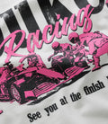 Front view of white vintage T shirt with bold Duke Racing script and crest graphic