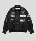 Front view of black BWT Alpine trackside jacket with patches and zipper