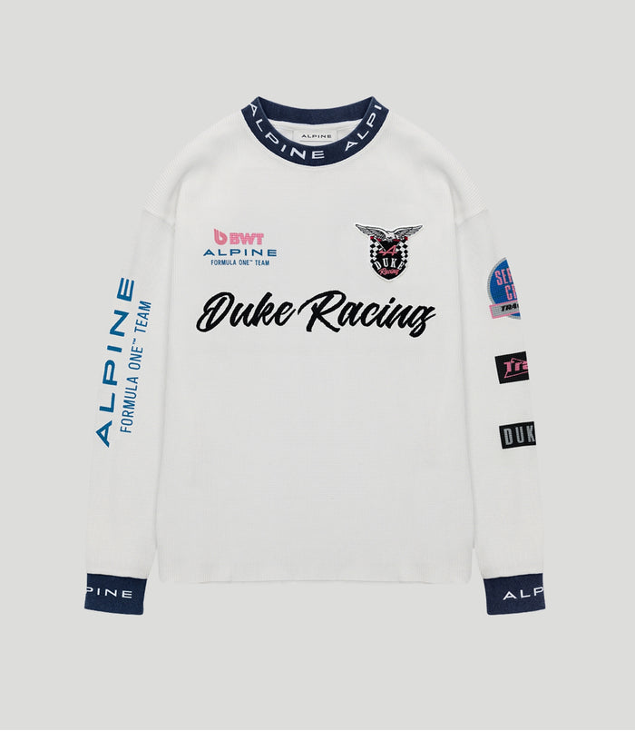 White waffle knit T shirt with navy Alpine collar and Duke Racing text with blue Alpine branding on sleeve