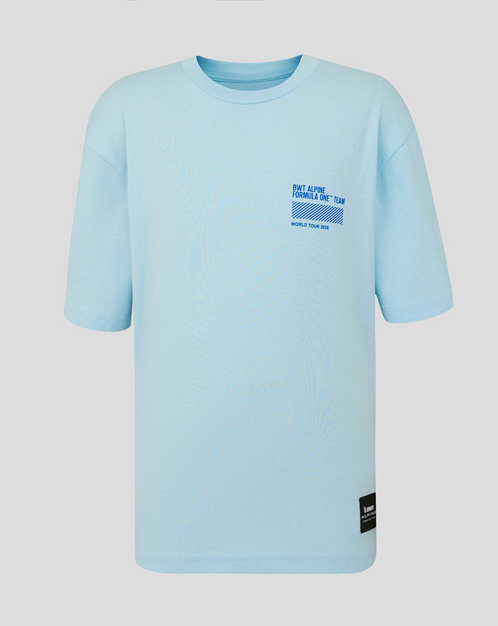 Light blue Junior Relaxed Fit World Tour T Shirt with small front graphic and Alpine badge at the hem.