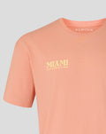 Close-up of coral pink Miami T-shirt with left chest Miami graphic and Alpine branding at the neckline.