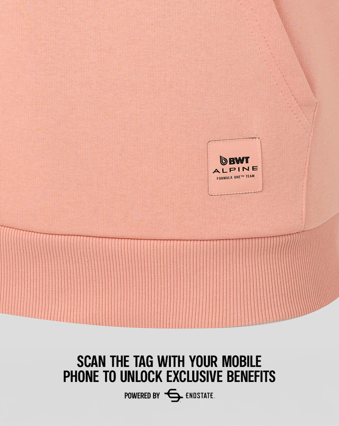Close-up of the lower hem with a BWT Alpine patch and ribbed band.