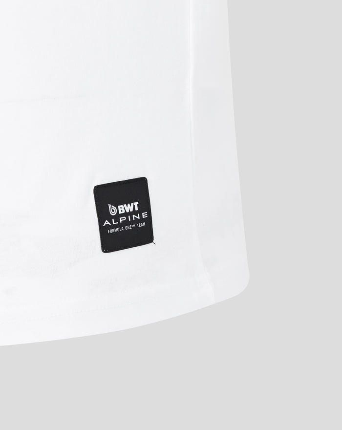 Hem area of white T shirt showing a black BWT Alpine patch with Formula One Team branding