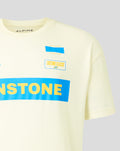 Cream T shirt close up showing a blue ALPINE Racing patch and an ENSTONE CLASSIC badge on the chest.