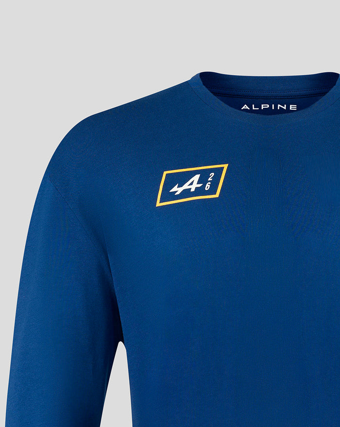 Chest view of blue Alpine F1 long sleeve T-shirt with a yellow framed logo featuring A 2 6.