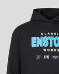Close up of black Alpine Classic F1 Overhead Hoodie showing the high collar and bold chest graphic.