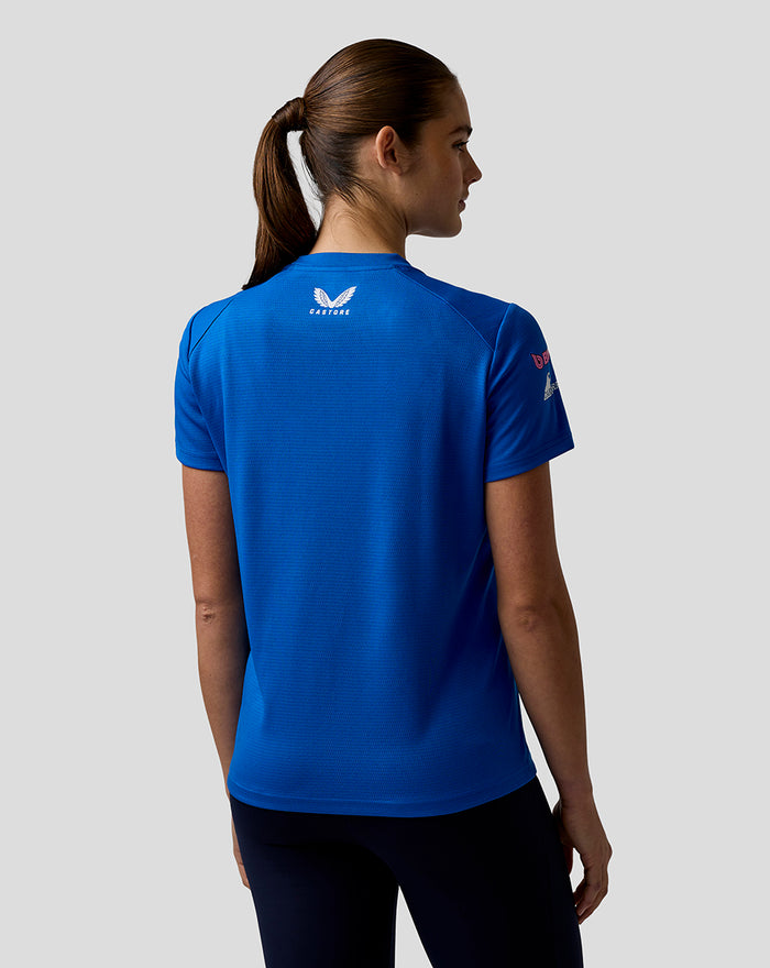 Back view of blue Formula One team T shirt with white Castore logo at the neck and sponsor logos on the sleeve