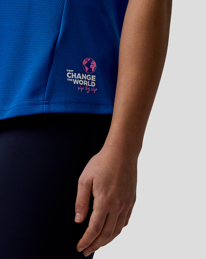 Blue BWT Alpine official women's F1 team T shirt close up showing logo at the hem